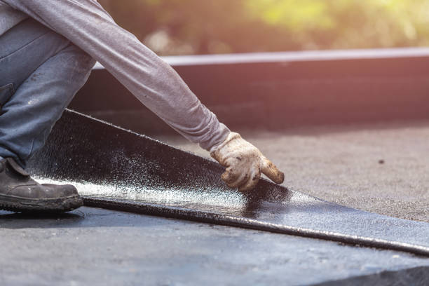 Professional Basement Waterproofing technician working in Montezuma, OH
